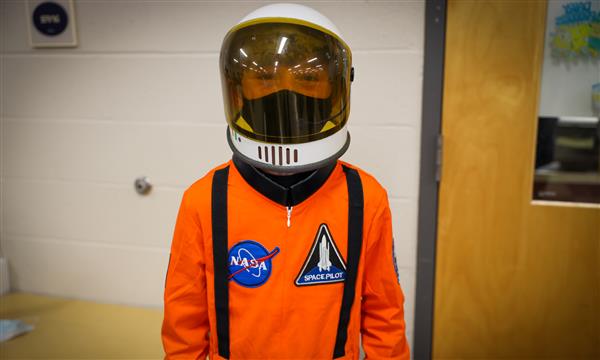 Boy dressed as astronaut
